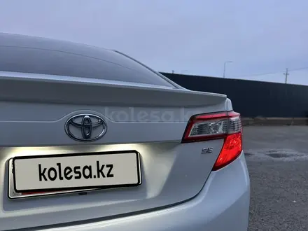 Toyota Camry 2013 года за 6 300 000 тг. в Атырау – фото 12