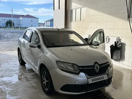 Renault Logan 2015 года за 3 500 000 тг. в Атырау – фото 2