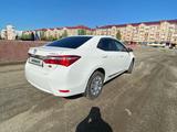 Toyota Corolla 2015 года за 7 600 000 тг. в Актобе – фото 4