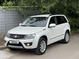 Suzuki Grand Vitara 2014 годаүшін8 600 000 тг. в Алматы