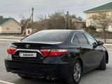 Toyota Camry 2017 года за 9 000 000 тг. в Жанаозен – фото 4