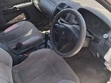 Mazda Familia 1998 годаүшін650 000 тг. в Талдыкорган – фото 3