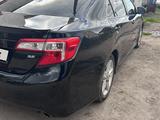 Toyota Camry 2014 года за 9 000 000 тг. в Караганда – фото 5