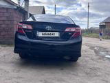 Toyota Camry 2014 года за 9 000 000 тг. в Караганда – фото 4