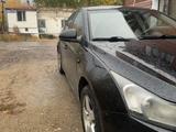 Chevrolet Cruze 2009 года за 3 500 000 тг. в Караганда – фото 4