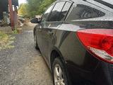 Chevrolet Cruze 2009 года за 3 500 000 тг. в Караганда – фото 3