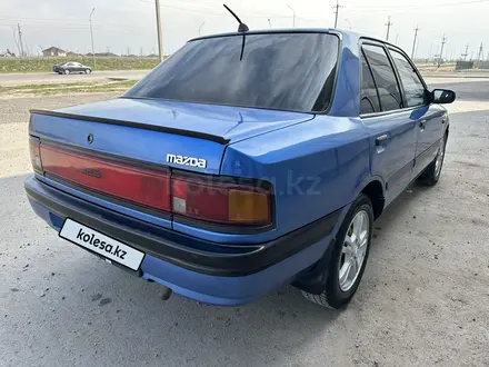 Mazda 323 1992 годаүшін1 370 000 тг. в Алматы – фото 4
