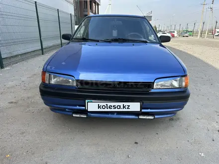 Mazda 323 1992 годаүшін1 370 000 тг. в Алматы – фото 5