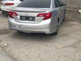 Toyota Camry 2014 годаfor6 800 000 тг. в Жанаозен