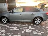 Chevrolet Cruze 2011 года за 1 800 000 тг. в Караганда – фото 5