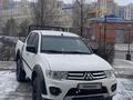 Mitsubishi L200 2014 года за 6 800 000 тг. в Астана – фото 2