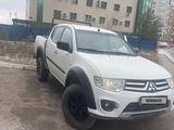 Mitsubishi L200 2014 годаүшін6 800 000 тг. в Астана – фото 2