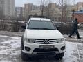 Mitsubishi L200 2014 года за 6 800 000 тг. в Астана