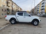 Mitsubishi L200 2012 года за 5 000 000 тг. в Караганда – фото 2