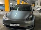 Tesla Model Y 2023 года за 21 000 000 тг. в Астана – фото 2