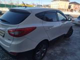 Hyundai Tucson 2013 годаүшін7 100 000 тг. в Астана – фото 3