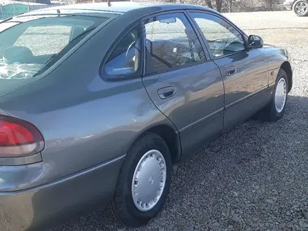 Mazda 626 1995 года за 1 850 000 тг. в Мерке – фото 3