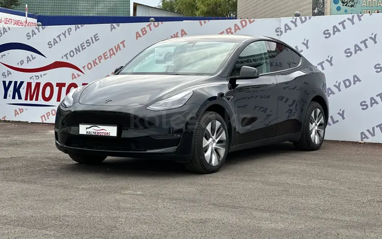 Tesla Model Y 2023 года за 16 500 000 тг. в Алматы