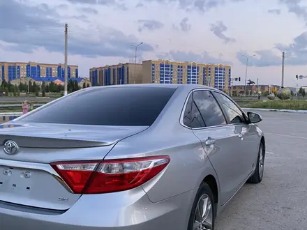 Toyota Camry 2015 года за 6 400 000 тг. в Актобе – фото 2