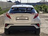 Toyota C-HR 2019 года за 11 500 000 тг. в Атырау – фото 2
