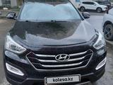 Hyundai Santa Fe 2014 годаүшін9 100 000 тг. в Уральск