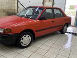 Mazda 323 1994 года за 1 100 000 тг. в Уральск – фото 2