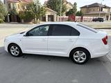 Skoda Rapid 2013 года за 3 500 000 тг. в Актобе – фото 3