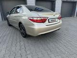 Toyota Camry 2015 годаүшін8 900 000 тг. в Актобе – фото 3