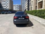 Volkswagen Jetta 2015 года за 4 200 000 тг. в Астана – фото 2