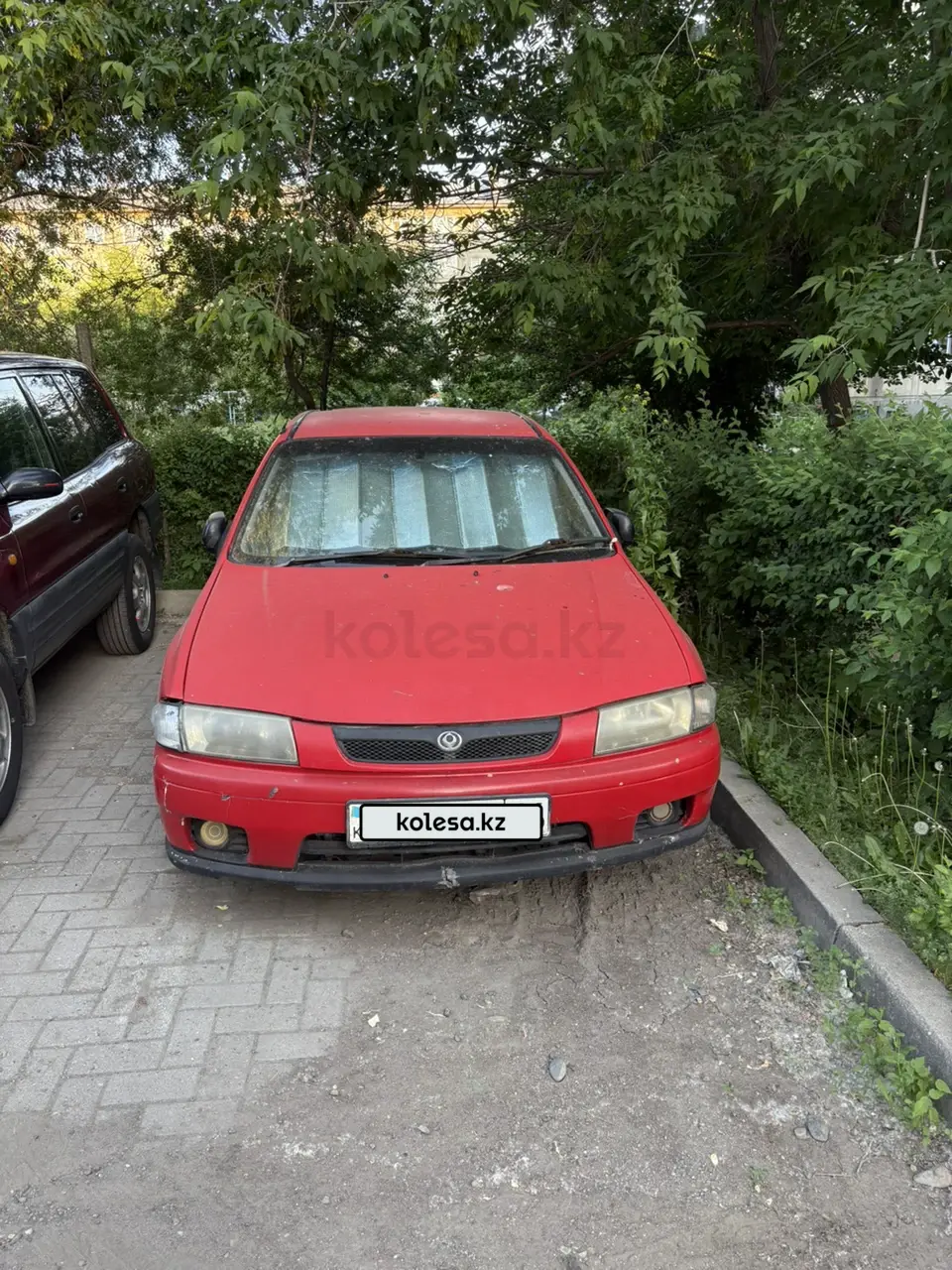 Mazda Familia, 1997