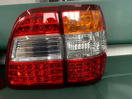 Задние фонари на крышке багажника Toyota Land Cruiser 100 Taiwan DEPO за 25 000 тг. в Алматы – фото 5