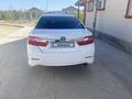 Toyota Camry 2014 года за 9 500 000 тг. в Атырау