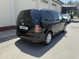 Volkswagen Touran 2009 года за 4 300 000 тг. в Тараз – фото 4