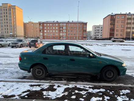 Mazda 323 1996 года за 2 580 000 тг. в Кокшетау – фото 4