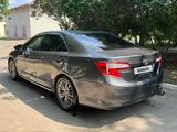 Toyota Camry 2014 года за 7 500 000 тг. в Уральск – фото 3