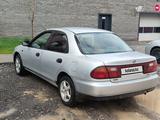 Mazda 323 1996 годаүшін1 350 000 тг. в Астана – фото 3