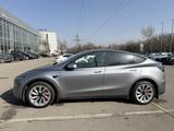Tesla Model Y 2024 года за 24 300 000 тг. в Алматы – фото 2