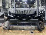 Toyota Camry 70 Передний бампер с решёткойүшін4 044 тг. в Шымкент