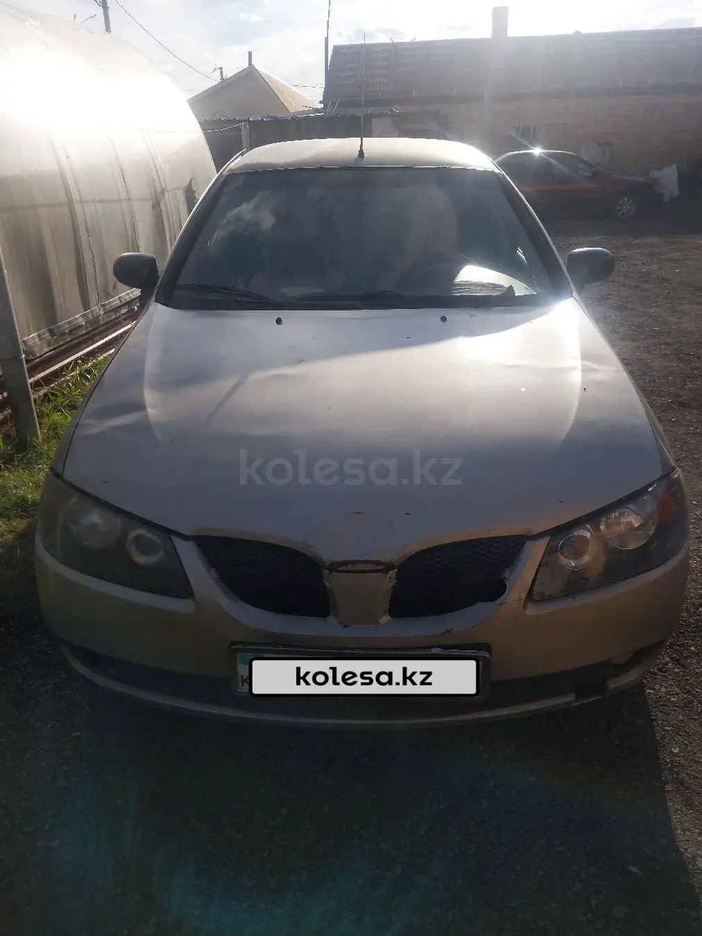 Nissan Almera, 2004