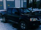 Nissan Navara 2010 года за 4 100 000 тг. в Астана