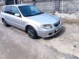 Mazda 323 2001 года за 2 500 000 тг. в Алматы – фото 4