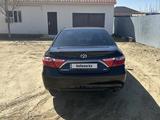 Toyota Camry 2015 года за 9 000 000 тг. в Кульсары – фото 4