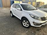 Kia Sportage 2013 года за 7 500 000 тг. в Актобе – фото 4