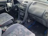 Mitsubishi Carisma 1997 года за 830 000 тг. в Уральск – фото 3