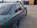 Mitsubishi Carisma 1997 года за 830 000 тг. в Уральск – фото 4