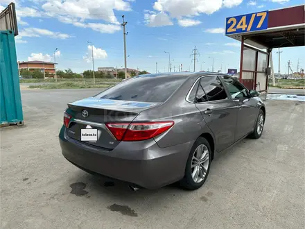 Toyota Camry 2015 года за 6 800 000 тг. в Атырау – фото 5