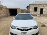 Toyota Camry 2013 года за 6 666 666 тг. в Жанаозен