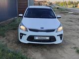 Kia Rio 2018 года за 6 150 000 тг. в Актобе – фото 2