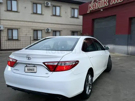 Toyota Camry 2015 года за 6 400 000 тг. в Атырау – фото 4