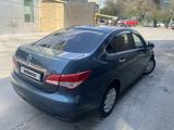 Nissan Almera 2014 года за 3 950 000 тг. в Алматы – фото 2